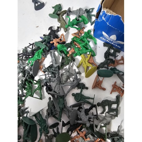36 - A box containing a collection of assorted plastic soldiers from various periods in history to includ... 