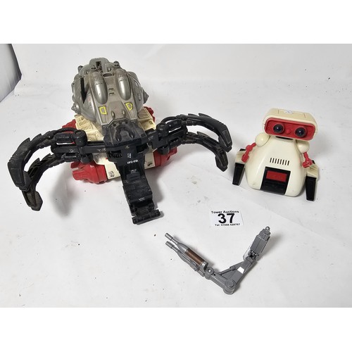 37 - 2x Tomy mechanical robot toys to include a R.O.B. style robotic figure in white and red together wit... 
