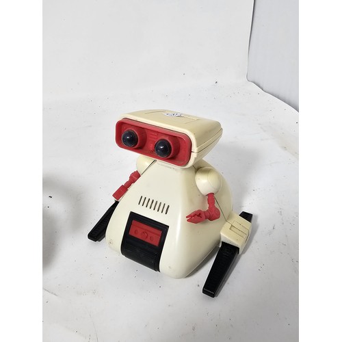 37 - 2x Tomy mechanical robot toys to include a R.O.B. style robotic figure in white and red together wit... 