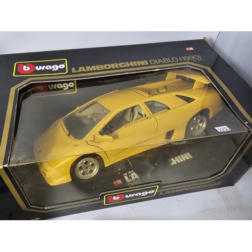 38 - 4x boxed 1/18 scale Burago diecast cars and a 1/43 Burago car. to include a Mercedes SSK, A lamborgh... 