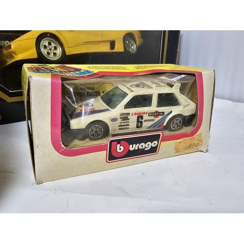38 - 4x boxed 1/18 scale Burago diecast cars and a 1/43 Burago car. to include a Mercedes SSK, A lamborgh... 