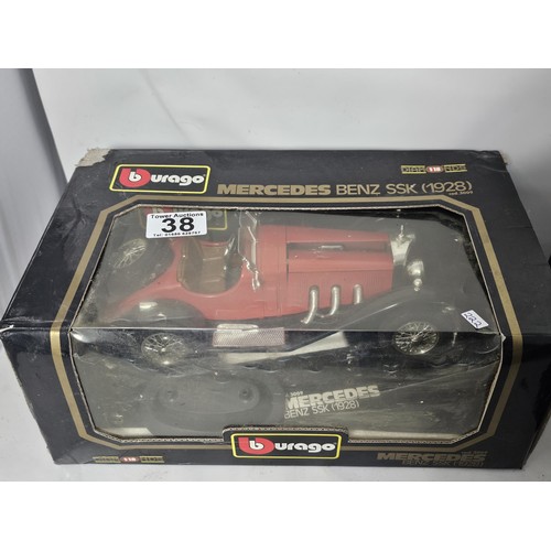 38 - 4x boxed 1/18 scale Burago diecast cars and a 1/43 Burago car. to include a Mercedes SSK, A lamborgh... 