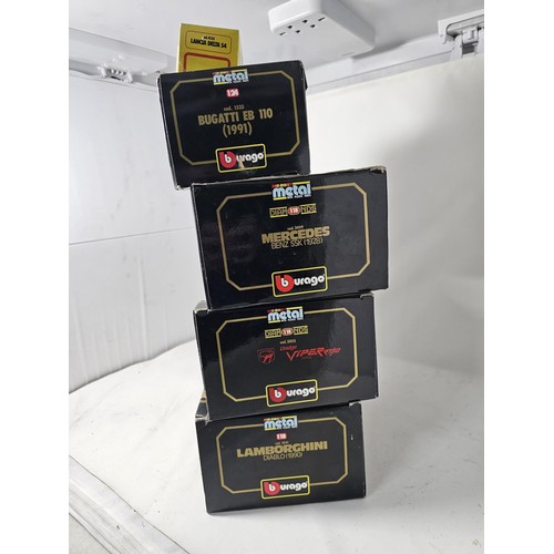 38 - 4x boxed 1/18 scale Burago diecast cars and a 1/43 Burago car. to include a Mercedes SSK, A lamborgh... 