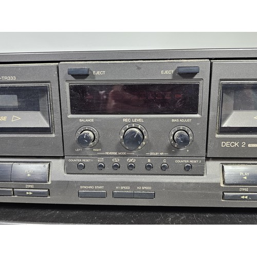 41 - A Technics double cassette player with auto reverse function, model RS-TR333, along with a stereo in... 