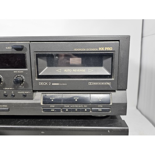 41 - A Technics double cassette player with auto reverse function, model RS-TR333, along with a stereo in... 
