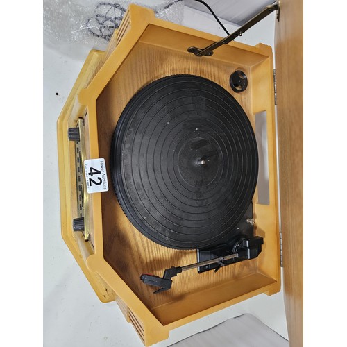 42 - A reproduction record player in a wooden case, fitted with a CD player and radio, in full working or... 