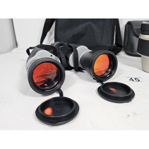45 - 2 pairs of cased binoculars, to include a pair of 10x50 six degrees field binoculars and a pair of S... 