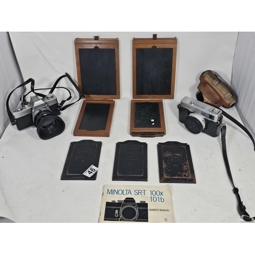 46 - A quantity of photographic items,to include a Minolta SRT100 35mm camera, complete with a Skylight 5... 