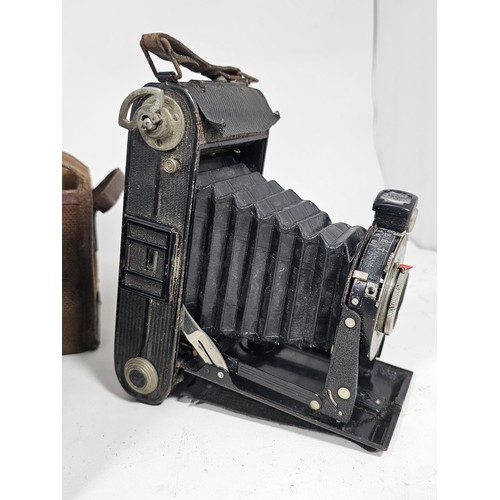 47 - A collection of 3 antique cameras, to include a Vario concertina camera, a cased number 2 Brownie ca... 