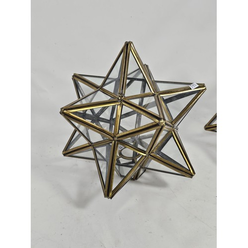 49 - A pair of star shaped 3D glass and metal lampshades, both in good order with a height of 24cm and a ... 