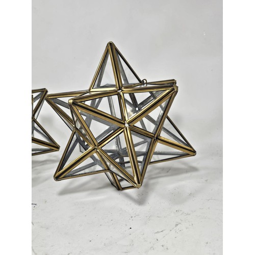 49 - A pair of star shaped 3D glass and metal lampshades, both in good order with a height of 24cm and a ... 