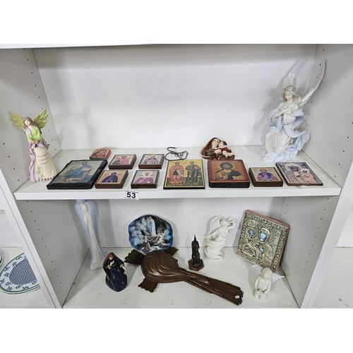 53 - 2 shelves containing a collection of religious related items, to include 11 Russian style iconograph... 