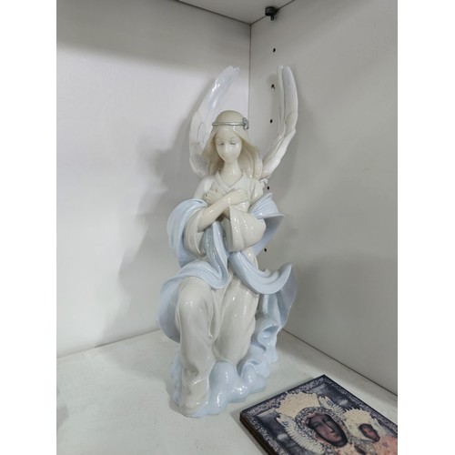 53 - 2 shelves containing a collection of religious related items, to include 11 Russian style iconograph... 
