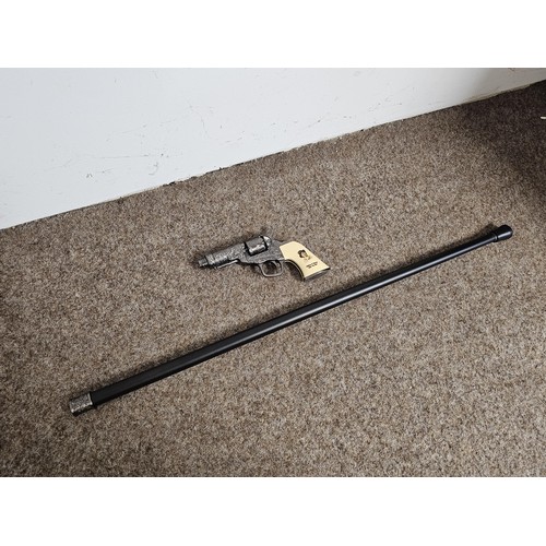 3 - A good quality novelty walking stick in the form of a handgun with a plastic grip with the name Bill... 