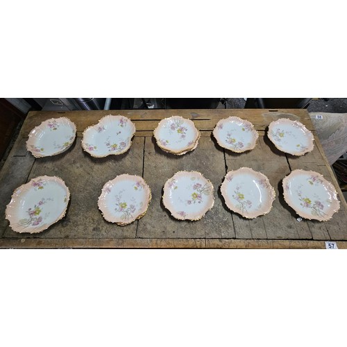 55A - A part set of early 20th century Limoges porcelain comprising of 10 hand painted cabinet plates and ... 