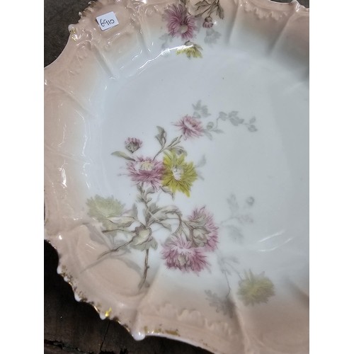 55A - A part set of early 20th century Limoges porcelain comprising of 10 hand painted cabinet plates and ... 