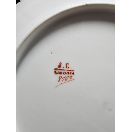 55A - A part set of early 20th century Limoges porcelain comprising of 10 hand painted cabinet plates and ... 
