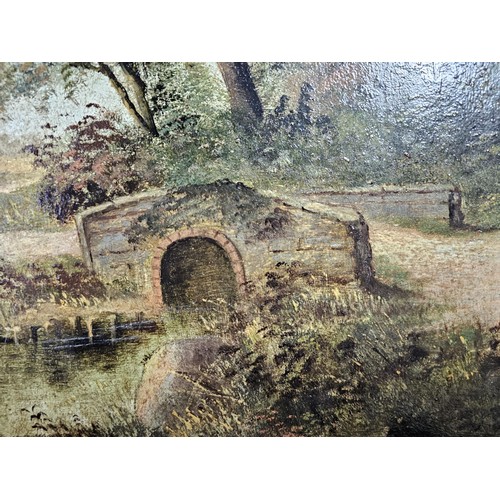 56 - A pair of antique gilt framed oil on board paintings of traditional rural England. Both are signed t... 