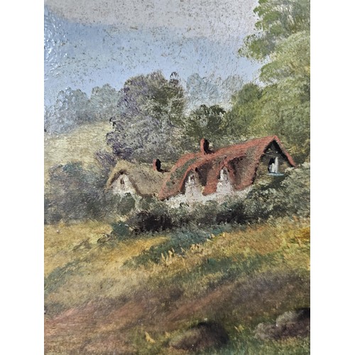 56 - A pair of antique gilt framed oil on board paintings of traditional rural England. Both are signed t... 