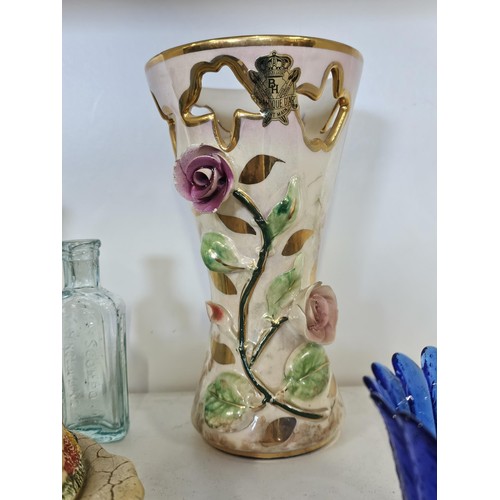 55 - A shelf full of collectables to include, a James Kent floral butter dish, a hand painted Belgium vas... 