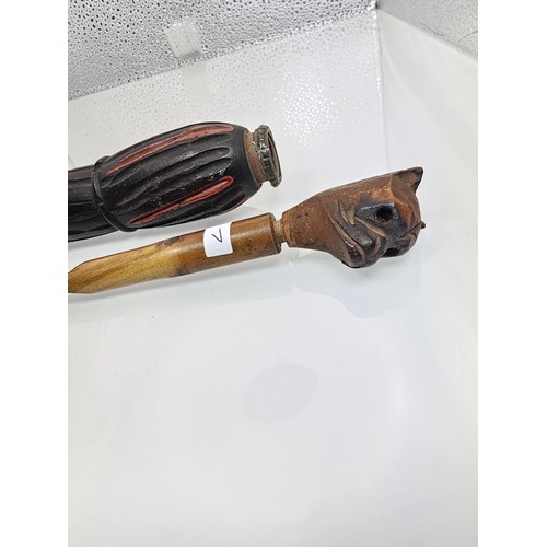 207 - An antique unusual black forest carved wooden novelty letter opener modelled in the form of a closed... 