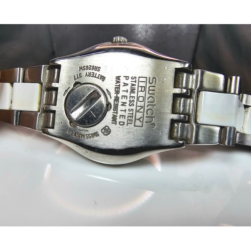 216 - A good quality Swatch Swiss Irony ladies wristwatch having a clean white dial with a cream Bezel and... 