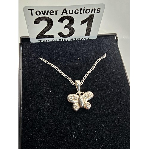 226 - A pretty 925 silver pendant and necklace featuring a silver butterfly pendant set with small CZ ston... 