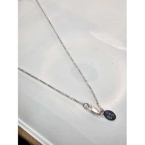 226 - A pretty 925 silver pendant and necklace featuring a silver butterfly pendant set with small CZ ston... 