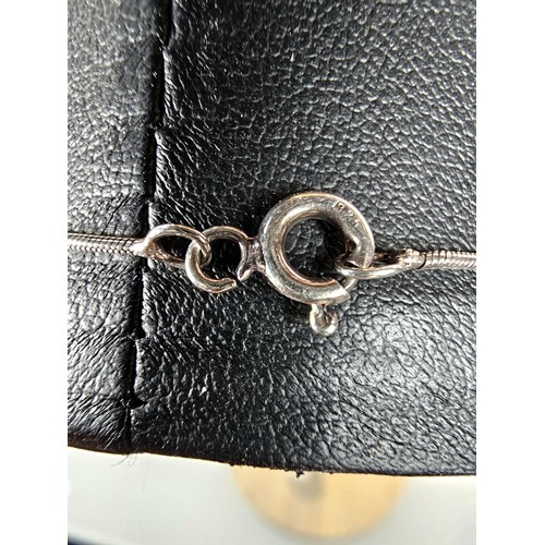 215 - A 925 silver pendant necklace featuring a bar formed silver pendant set with a real round cut diamon... 