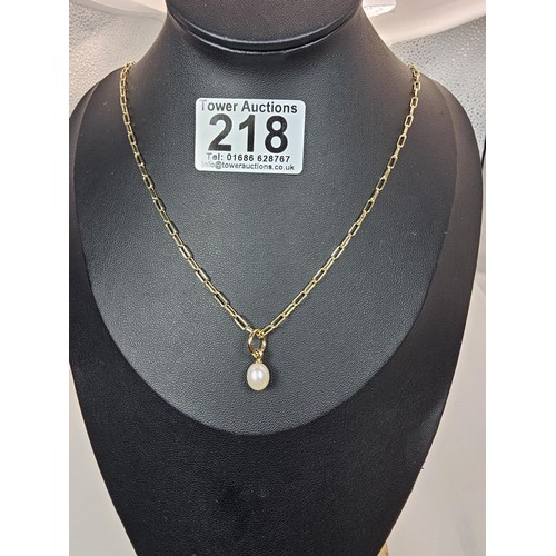 218 - An as new unused attractive gold on 925 silver pendant necklace featuring a elegant pendant set with... 