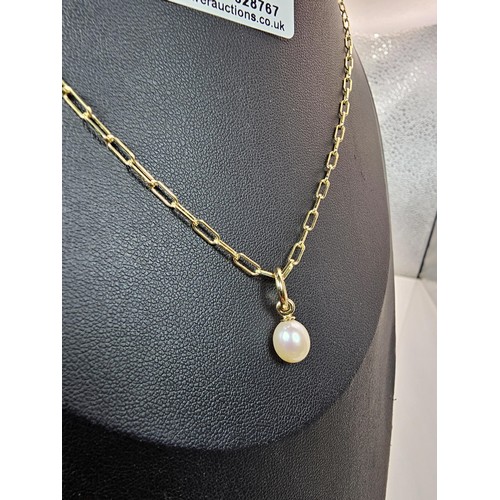 218 - An as new unused attractive gold on 925 silver pendant necklace featuring a elegant pendant set with... 