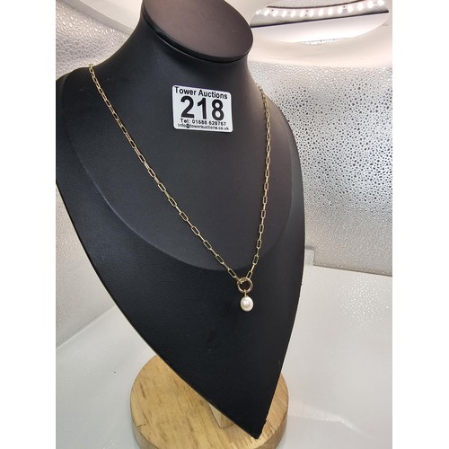 218 - An as new unused attractive gold on 925 silver pendant necklace featuring a elegant pendant set with... 