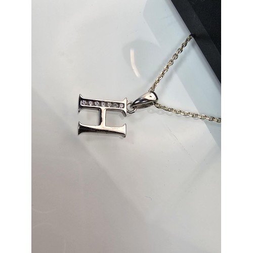 220 - A 925 silver pendant necklace featuring a silver letter H pendant set with sparkly crystal CZ stones... 