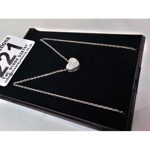 221 - An elegant 25 silver pendant necklace, featuring a silver heart shaped pedant, set with sparkly crys... 