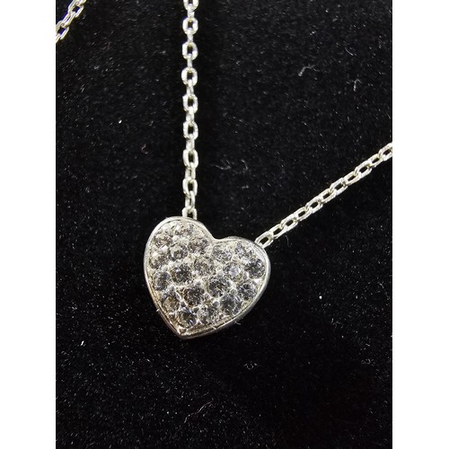 221 - An elegant 25 silver pendant necklace, featuring a silver heart shaped pedant, set with sparkly crys... 
