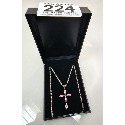 224 - An attractive as new unused 925 silver pendant necklace featuring a Cross formed pendant set with pi... 