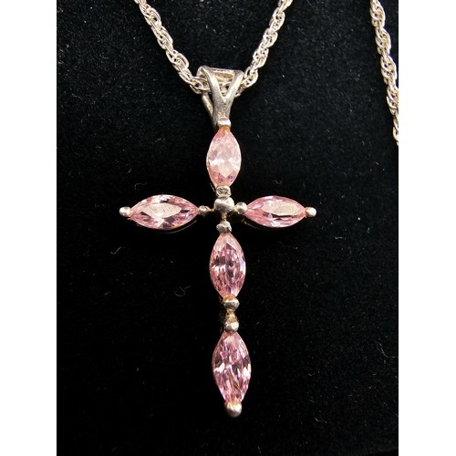 224 - An attractive as new unused 925 silver pendant necklace featuring a Cross formed pendant set with pi... 
