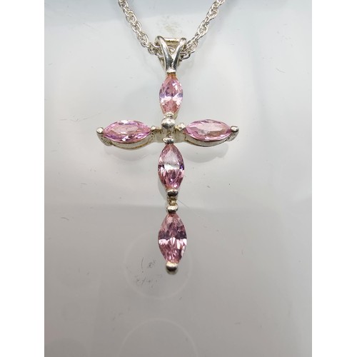 224 - An attractive as new unused 925 silver pendant necklace featuring a Cross formed pendant set with pi... 