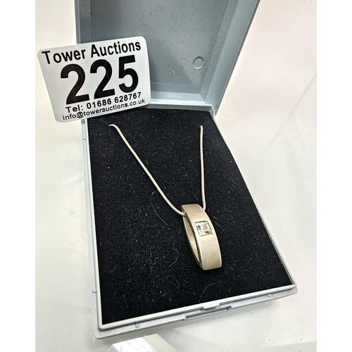 225 - An as new unused 925 silver pendant necklace featuring a chunky 925 silver pendant, set with a squar... 