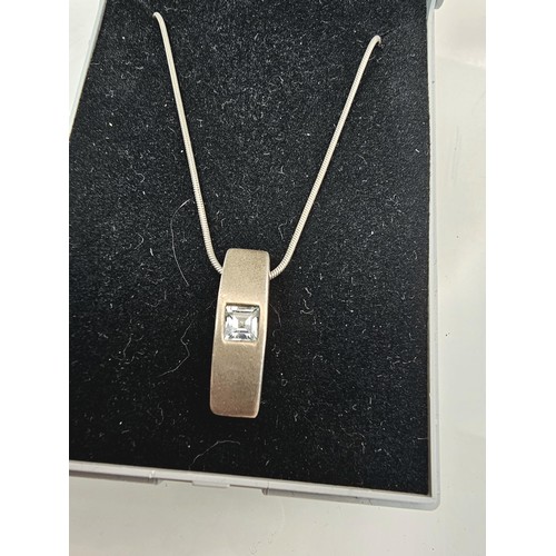 225 - An as new unused 925 silver pendant necklace featuring a chunky 925 silver pendant, set with a squar... 