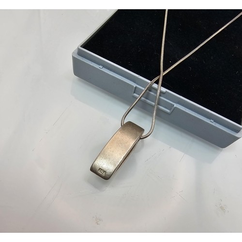 225 - An as new unused 925 silver pendant necklace featuring a chunky 925 silver pendant, set with a squar... 