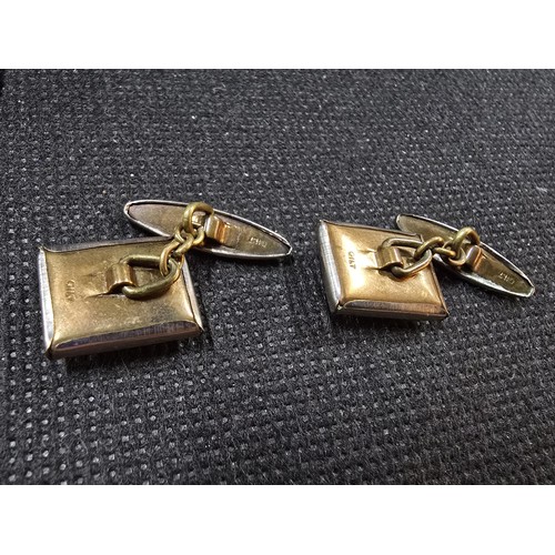 201 - A vintage attractive pair of 1930's Essex crystal style cuff links, featuring a dogs head which is r... 