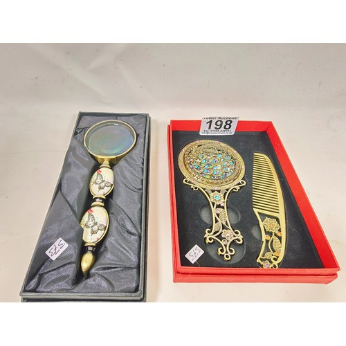 198 - 2x boxed as new collectables, to include a very attractive hand mirror and comb set, the mirror has ... 