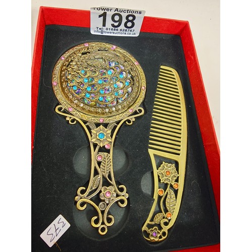 198 - 2x boxed as new collectables, to include a very attractive hand mirror and comb set, the mirror has ... 