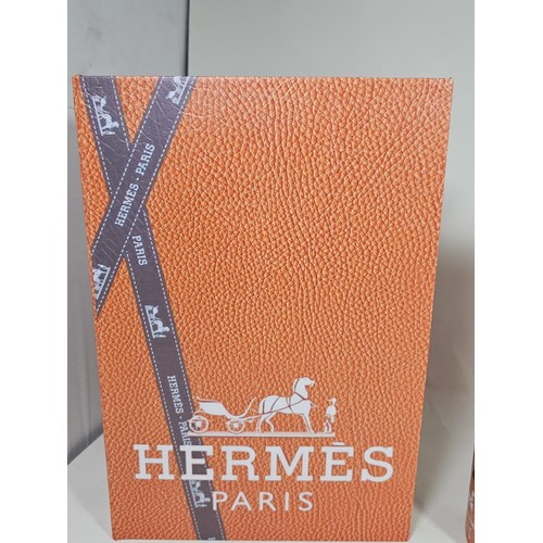 179 - A collection of 3 graduated storage boxes, all stamped with Hermes Paris. the largest box has a heig... 