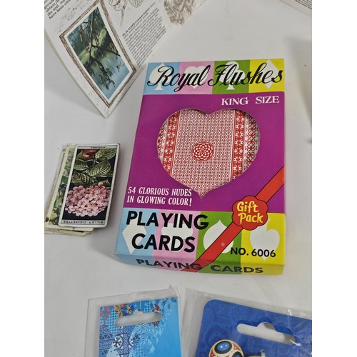 180 - A box of collectables, to include a quantity of 2018 Fifa World Cup Russia keyrings and pin badges, ... 