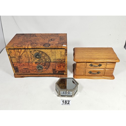 182 - A collection of 3 trinket boxes, to include a 2 drawer trinket box with a champagne design, a 2 draw... 