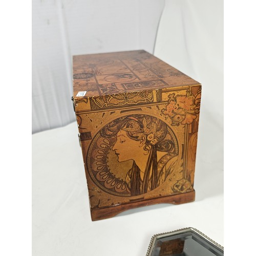 182 - A collection of 3 trinket boxes, to include a 2 drawer trinket box with a champagne design, a 2 draw... 