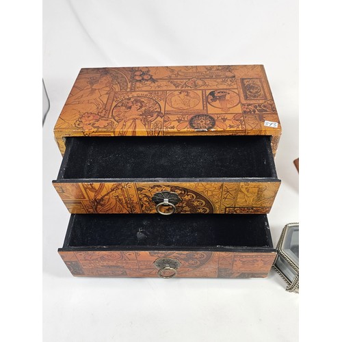 182 - A collection of 3 trinket boxes, to include a 2 drawer trinket box with a champagne design, a 2 draw... 