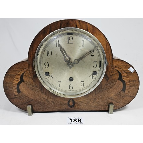 188 - An ornate Art Deco club shaped mantel clock with Whittington and Westminster chimes, appears to be i... 